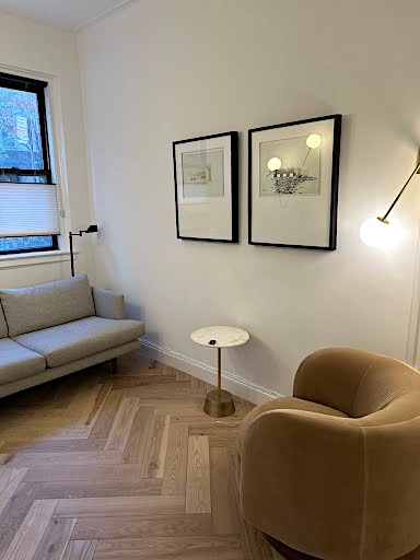 Comfortable living room setup with couch and lamp